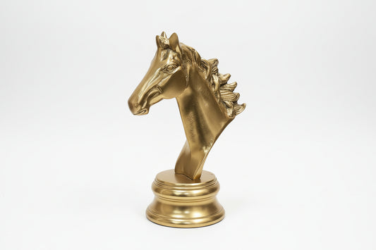 Gold horse head wall sconce with marble background